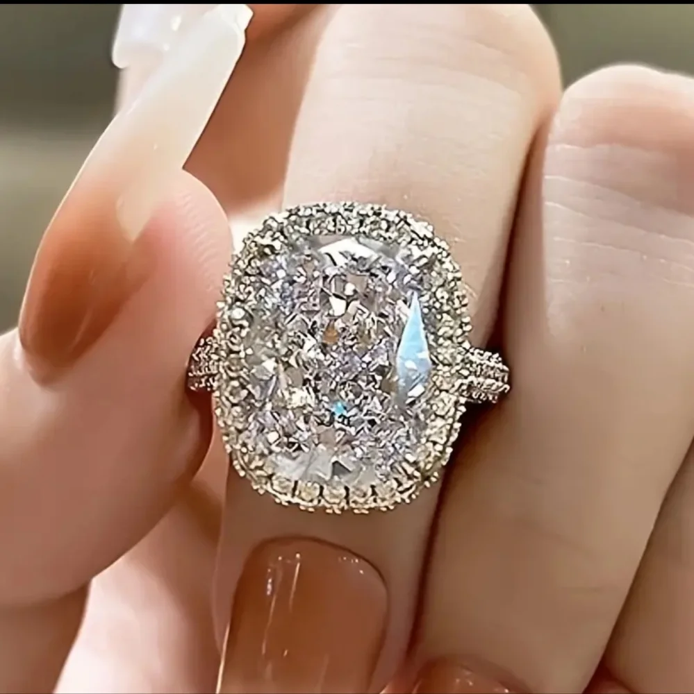 Oval Halo Engagement Ring in Clear and Silver